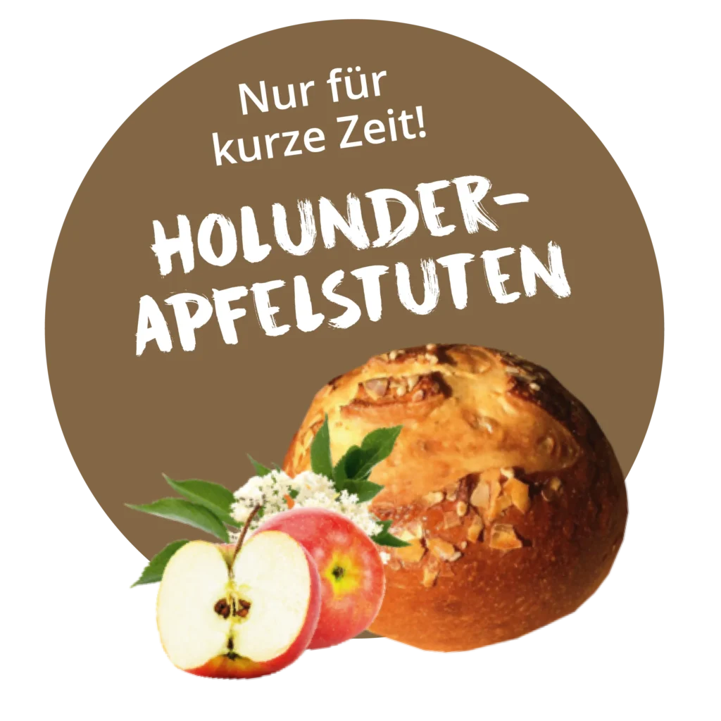 Runder Brotlaib mit Apfelscheiben und Holunderblüten daneben. Der Text auf Deutsch lautet: Nur für kurze Zeit! HOLUNDER-APFELSTUTEN (Nur für kurze Zeit! Holunder-Apfelbrot).